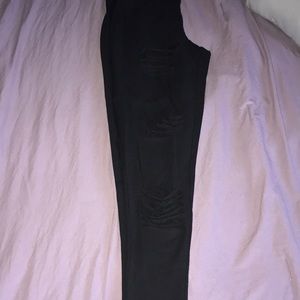 Ripped fishnet leggings